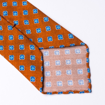 Krawatte in Orange  mit blauem Blumenmuster
